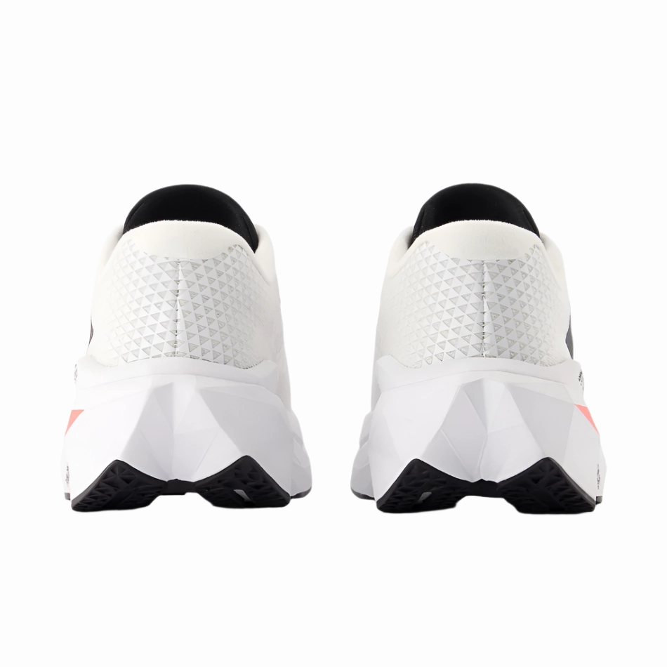 New Balance Women's Fuelcell Supercomp Trainer V3 Running Shoes in Sea Salt/Urgent Red/Black AW25 flat - terrain - runner running on beach shoes