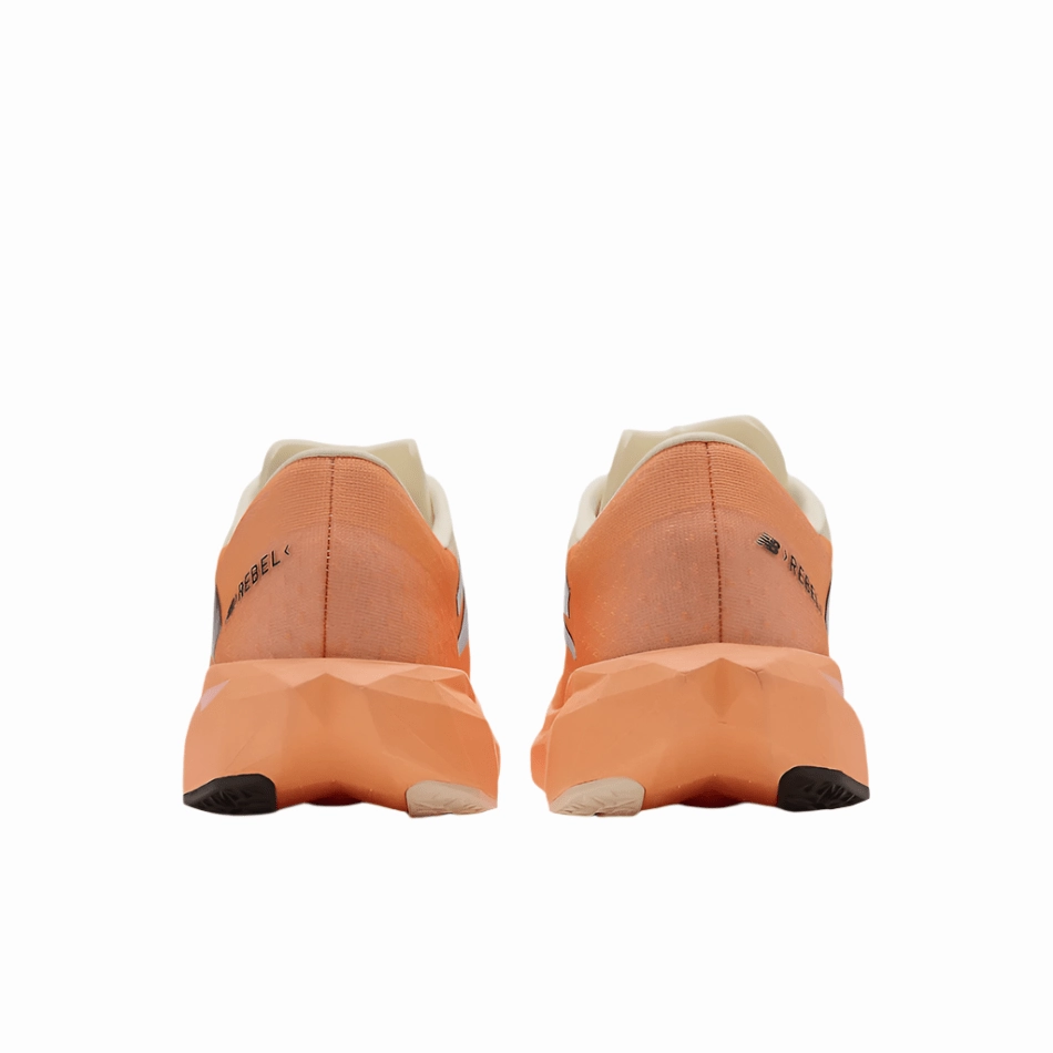 New Balance Women's FuelCell Rebel V4 Running Shoes in Hot Mango/Angora/Black SS25 Shock Absorbing Midsole High Traction Outsole