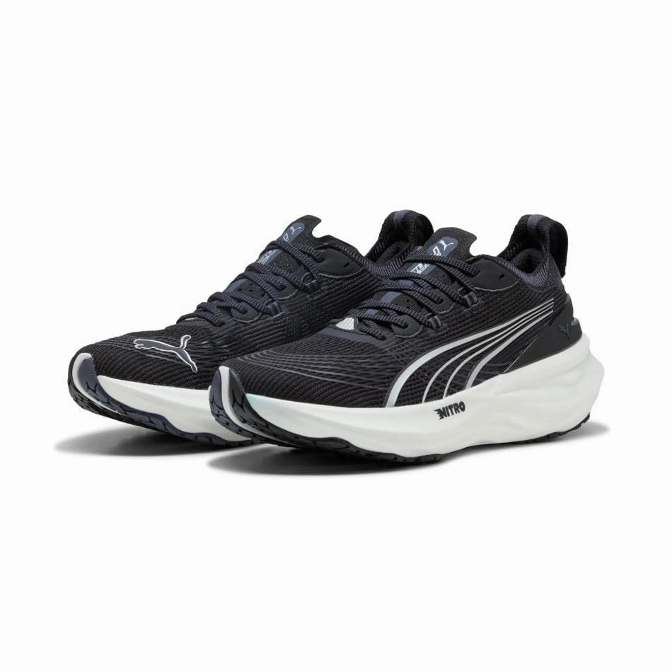 Puma Men's ForeverRun NITRO 2 Running Shoes in PUMA Black/PUMA White SS25 running in a tram station area shoes
