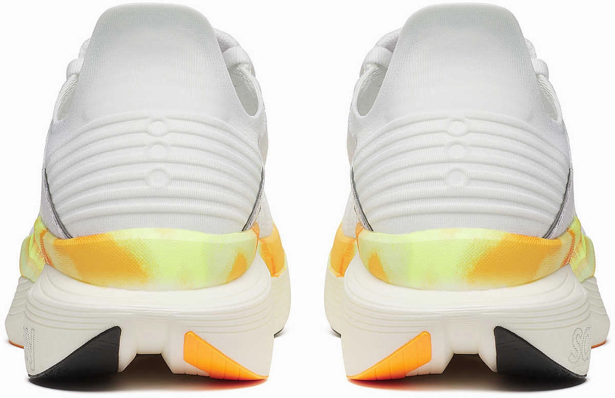 Saucony Endorphin Elite 2 Running Shoes - White long - distance - runner running with ankle braces